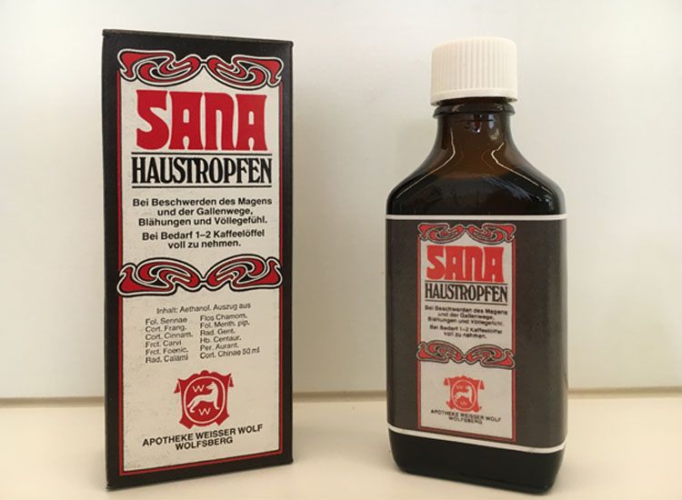 Sana Haustropfen - Eine Flasche Santa steht neben einer Box, die das Produkt ansprechend präsentiert